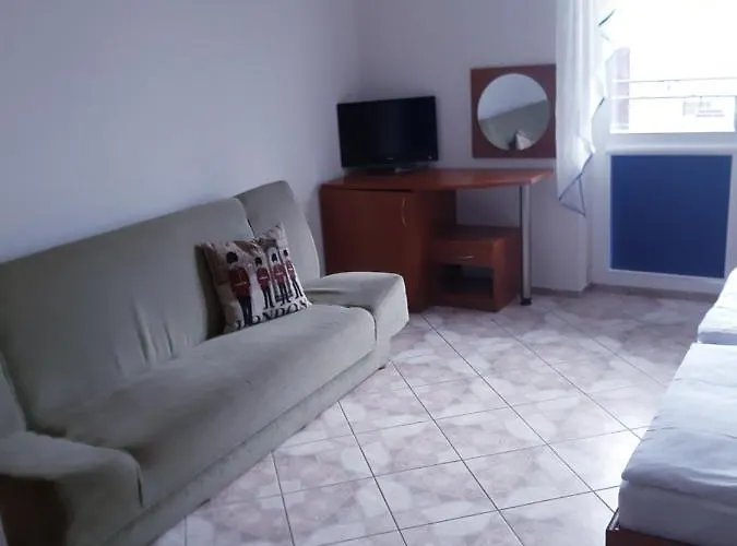 Caliente / Ozzy Pensión 3*